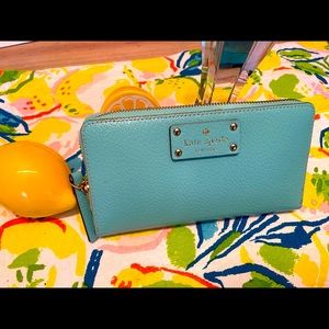 Kate Spade Robin’s egg blue zipper wallet with lots of pockets
